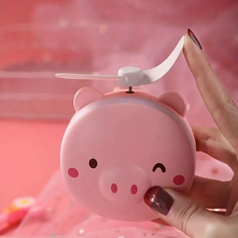 PiggyGlow: Cartoon Pig LED Mirror Pocket Fan for Makeup, Touch-Ups & Cooling - Juggledrops