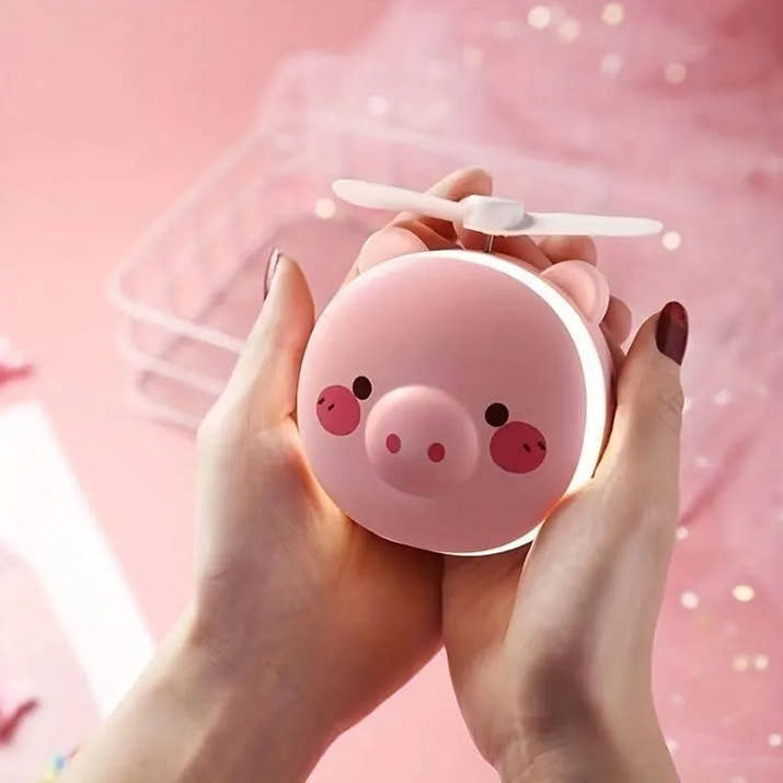 PiggyGlow: Cartoon Pig LED Mirror Pocket Fan for Makeup, Touch-Ups & Cooling - Juggledrops