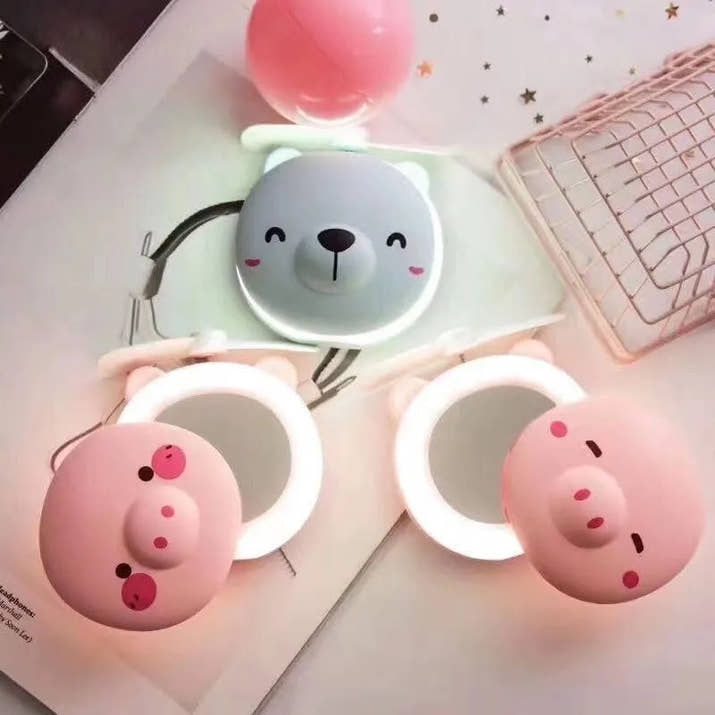 PiggyGlow: Cartoon Pig LED Mirror Pocket Fan for Makeup, Touch-Ups & Cooling - Juggledrops